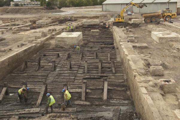 Archaeologists excavating the remains of the 18th century wooden slipway