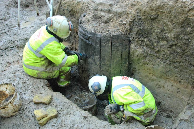 Archaeologists excavate one of the medieval timber wells