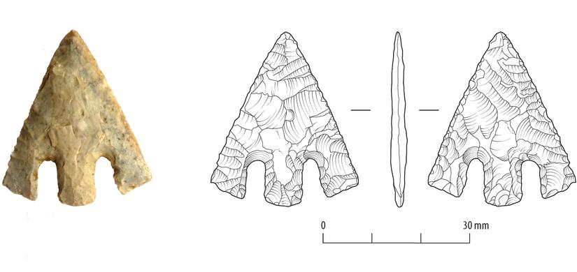 A bronze age arrowhead with an archaeological illustration next to it