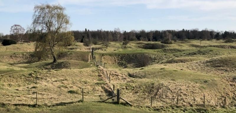 Rural landscape with dips and holes from quarrying