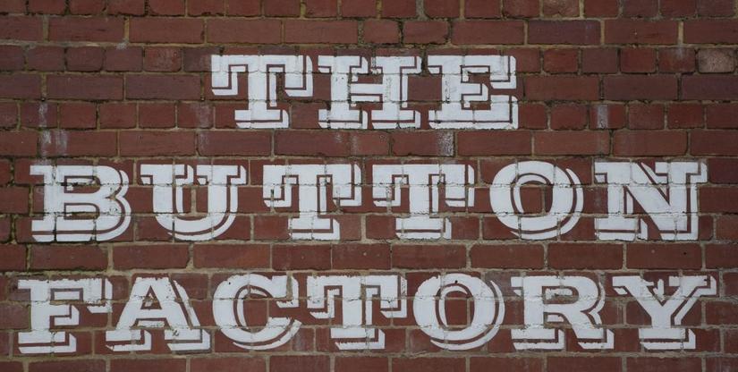 Sign for the button factory