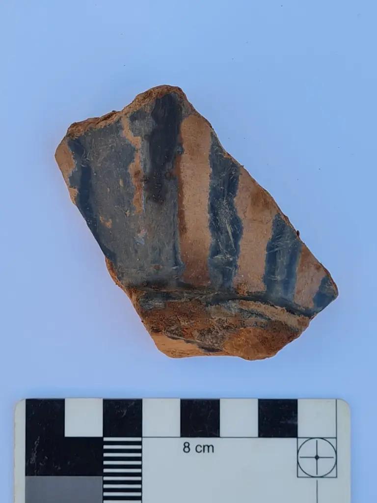 Potsherd with striped blue glaze
