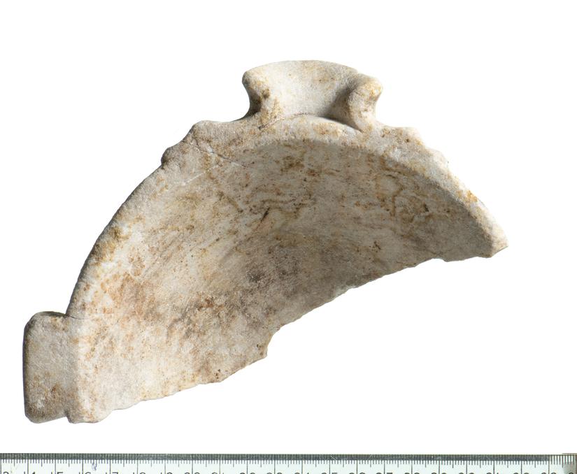 Half of a white marble basin