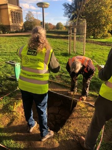 Volunteers recording a test pit