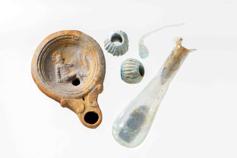 Roman lamp, glass vial and beads