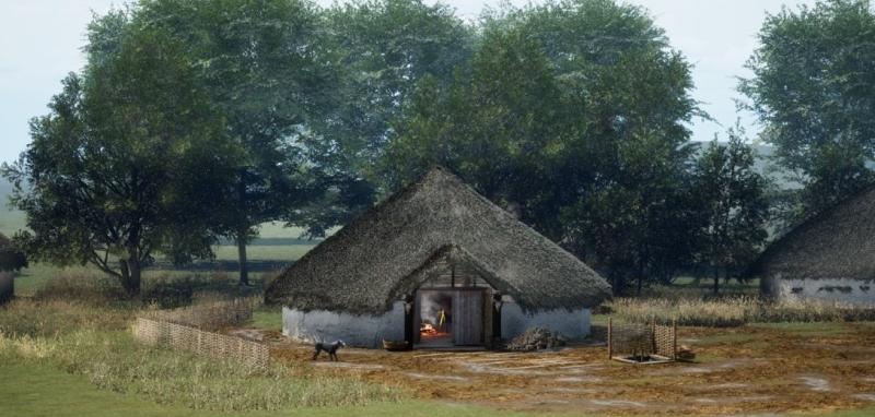 Image of finished roundhouse, surrounded by a low fence with trees behind the house