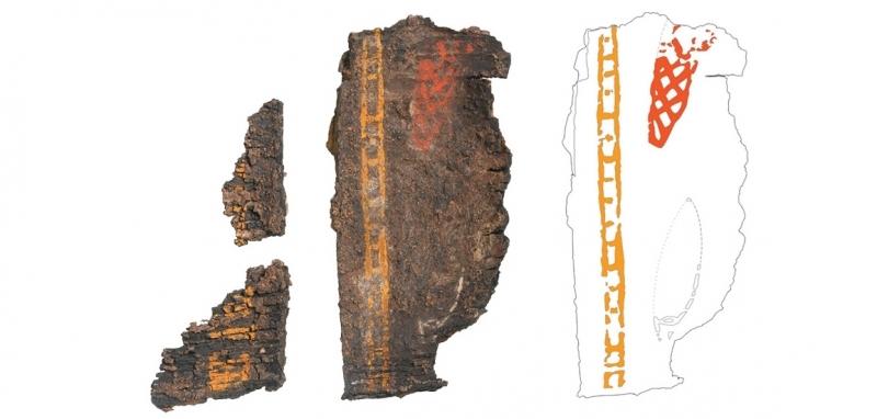 Fragments of painted wood with a sketch showing the painted areas