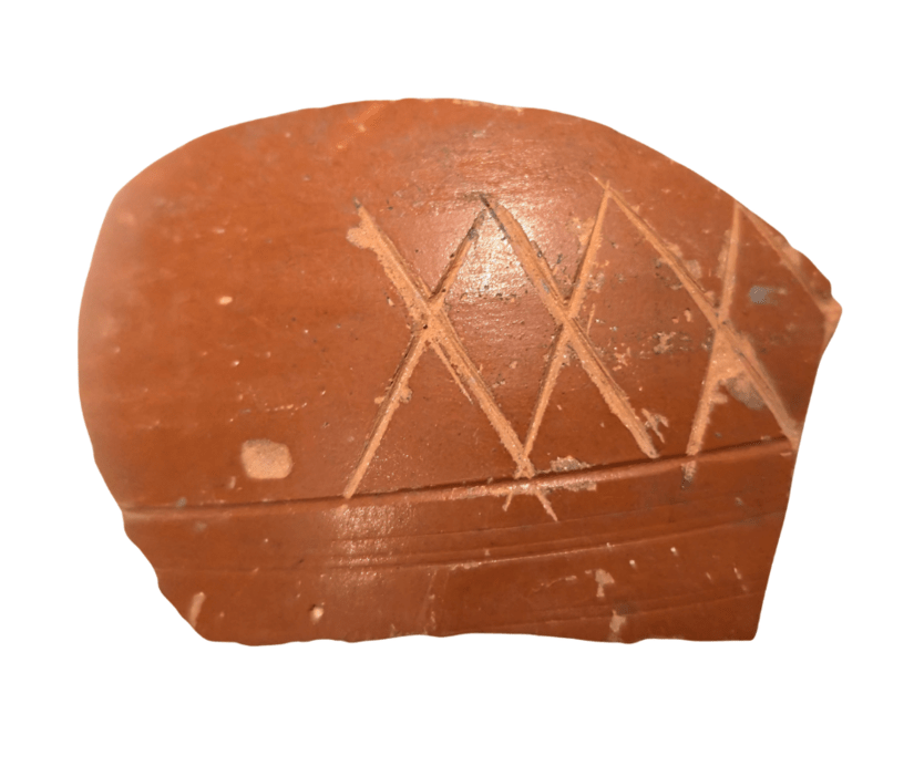 a piece of samian ware with XXX scored into it