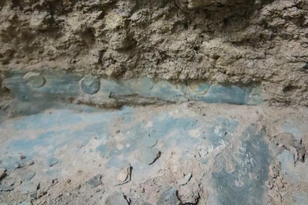 Rivets joining the copper alloy bowl to the iron band