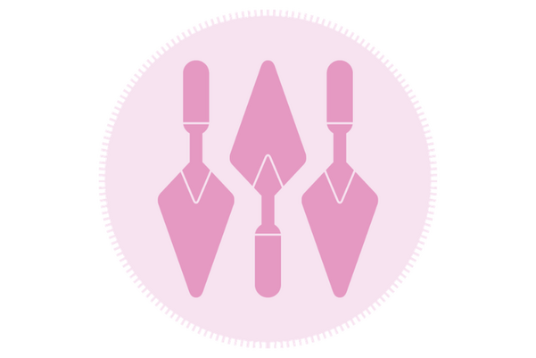 A pink circle with three trowels inside
