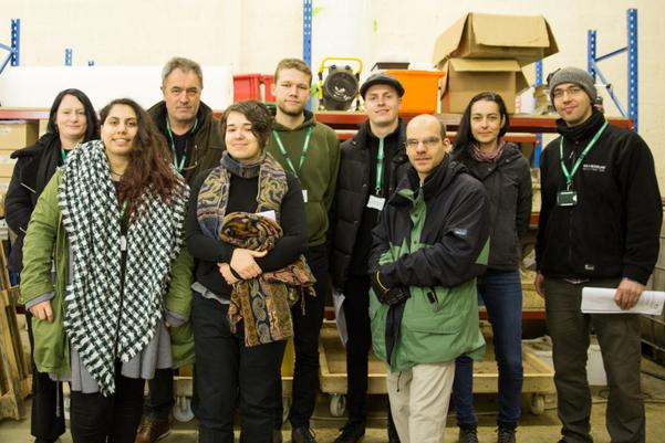 A group of people posing for a group photo