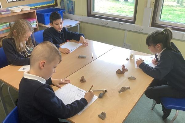 Children working around a table