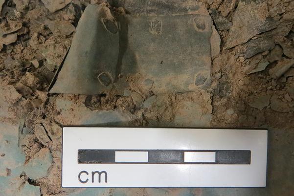 A patch used to repair the cauldrons with misshapen rivets