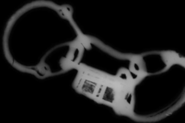 X-ray of the shackles showing more detail including a padlock in the shackles