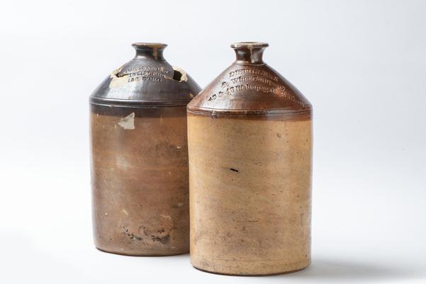 Two ceramic wine bottles