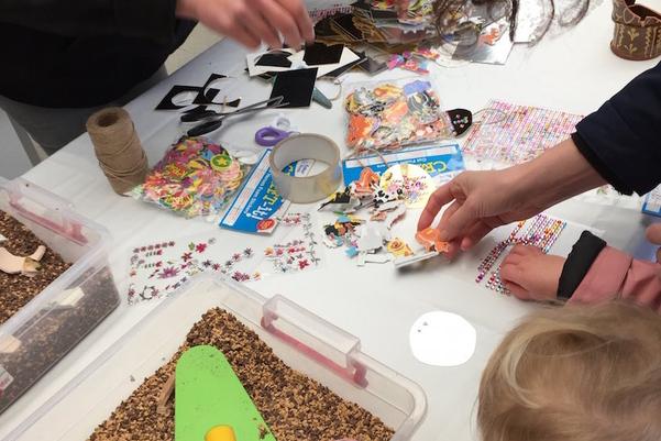 hands doing art activities