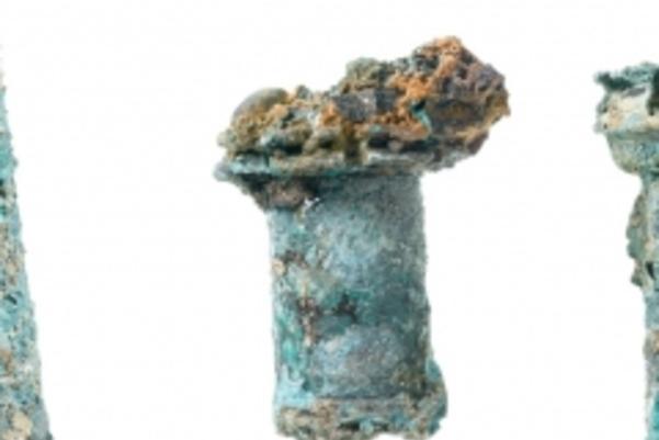 Photo of small rusted parts from umbrellas