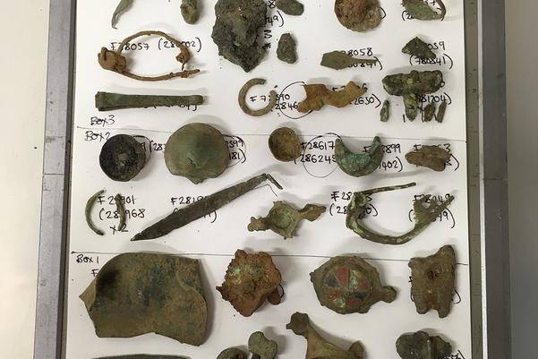 Metal finds laid out for x-ray