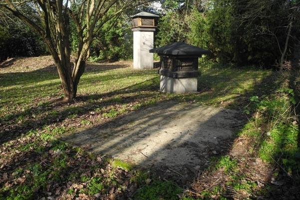Two 1940s airvents which still stand in the grounds. They are white columns with pointed roofs