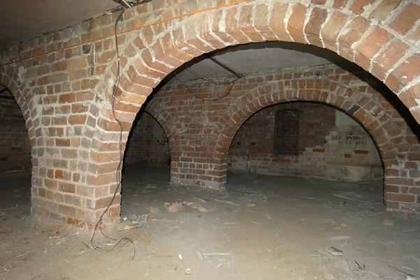 Low brick arches in the basement