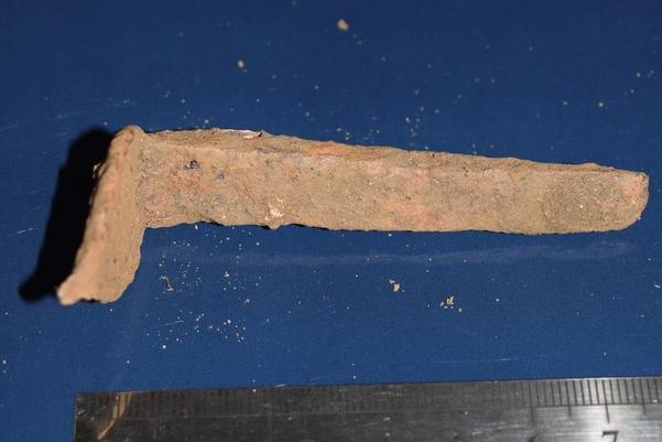 Metal object with scale