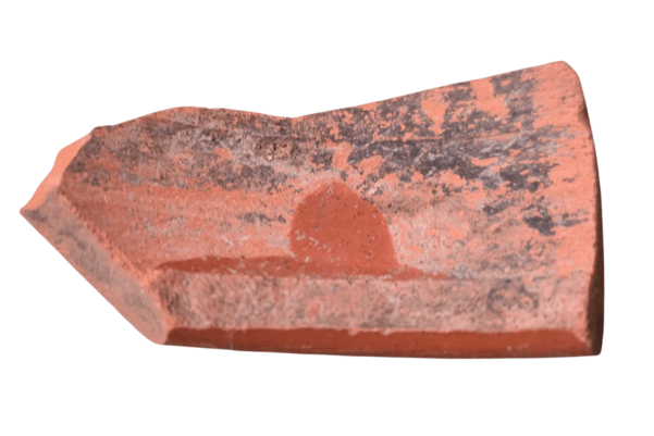 Fragment of samian ware with ink on the inside